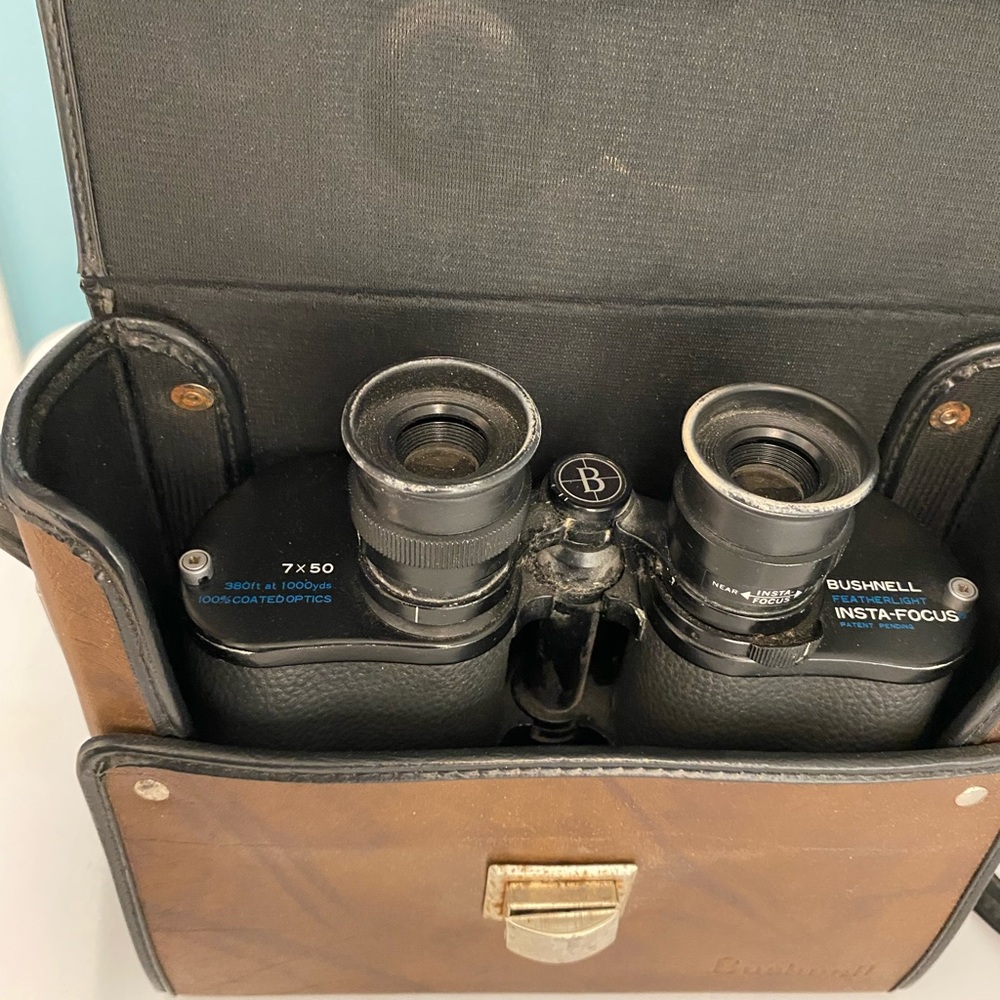 Large vintage Bushnell binoculars in case
